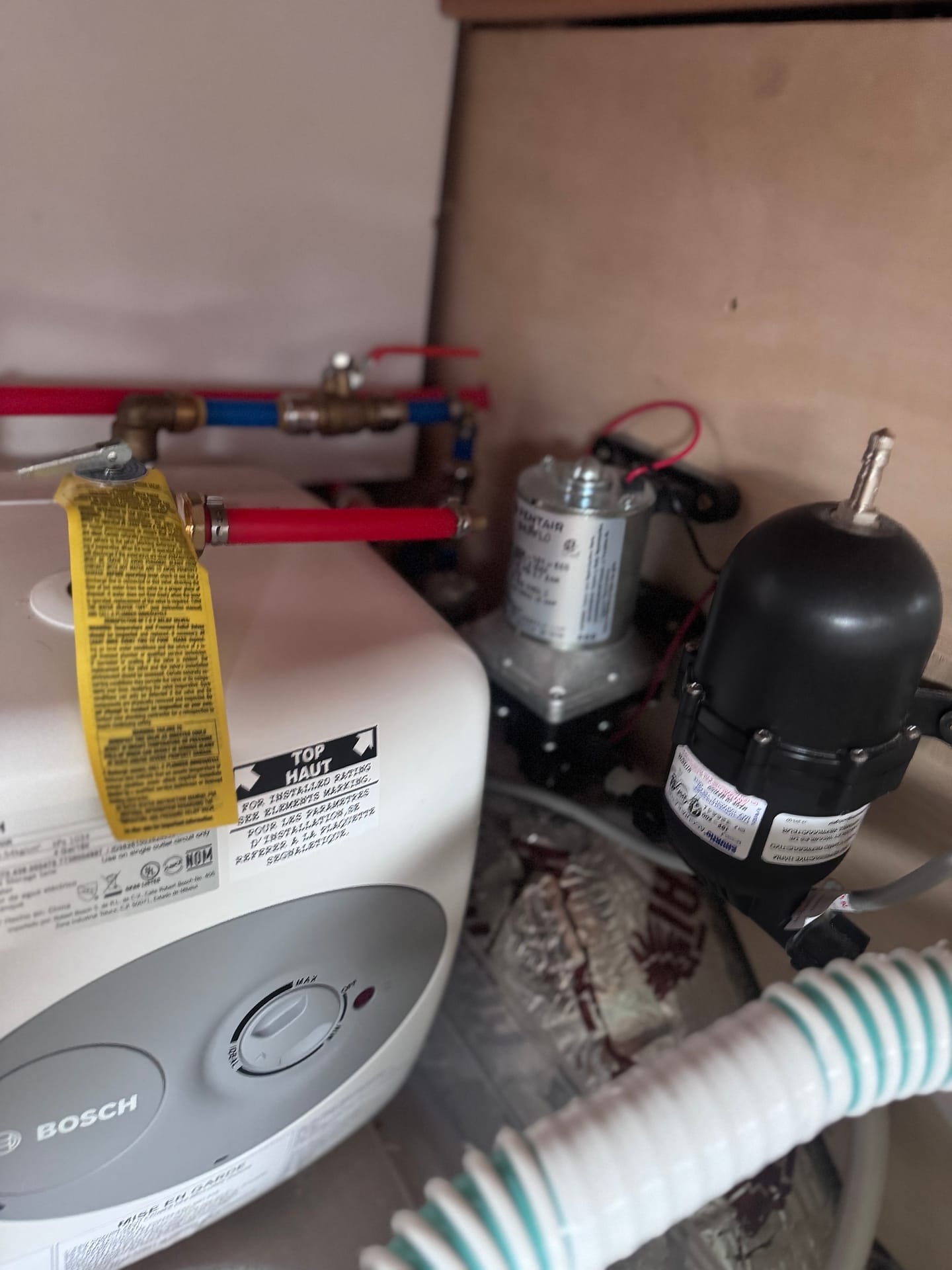 Plumbing system in a cargo trailer conversion